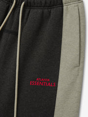 Falcons Lounge Sweatpant close up in black fleece with gray side panel cream drawstring and red Atlanta Essentials embroidery shown as a Bottoms product detail